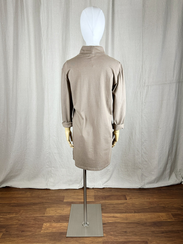 A full image of the back of the Jersey Turtleneck Dress shown on a female mannequin form