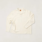 White blouse on a light gray background