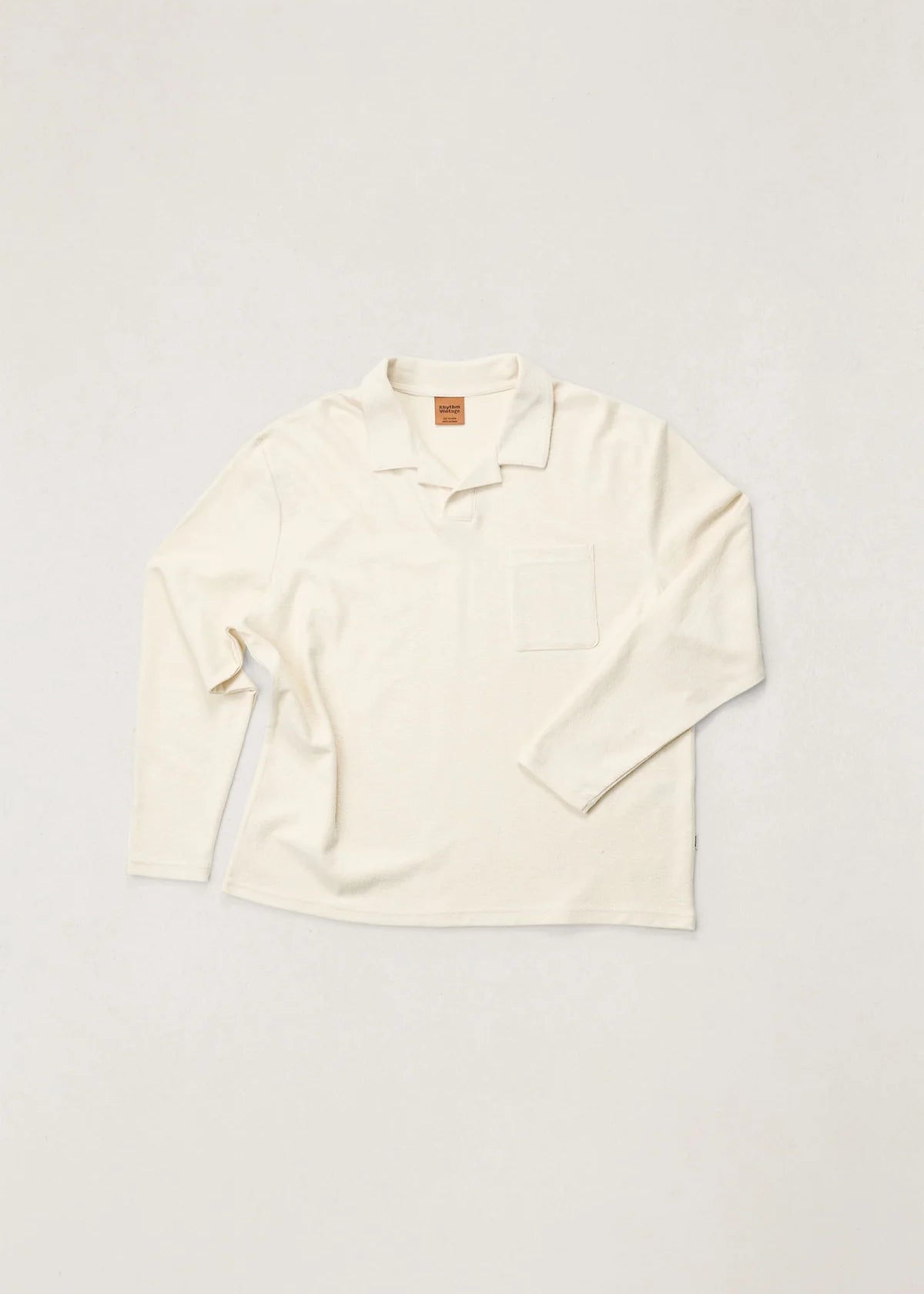 White blouse on a light gray background