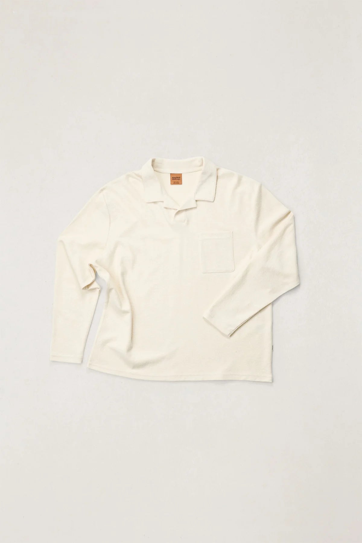 White blouse on a light gray background