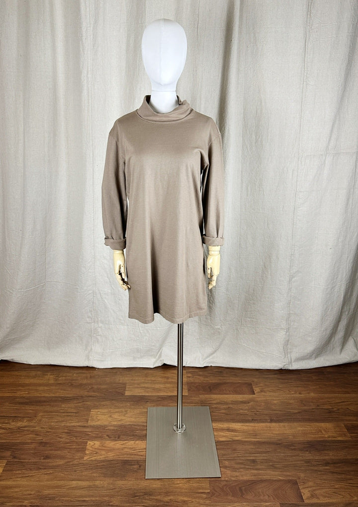 A full image of the Jersey Turtleneck Dress shown on a female mannequin form