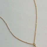 Black Starburst Necklace - Gold