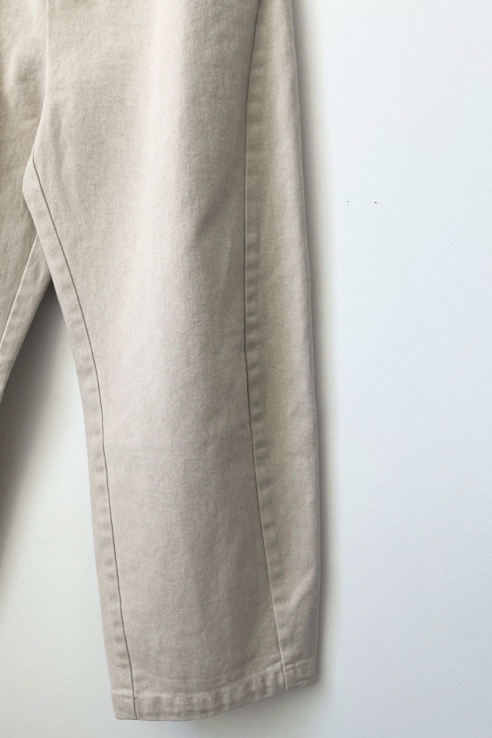 Beige pants on a white background