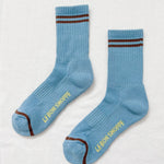Powder blue socks with brown stripes on a white background.