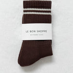 Brown sock with white stripes on a white background, labeled 'Le Bon Shoppe'.