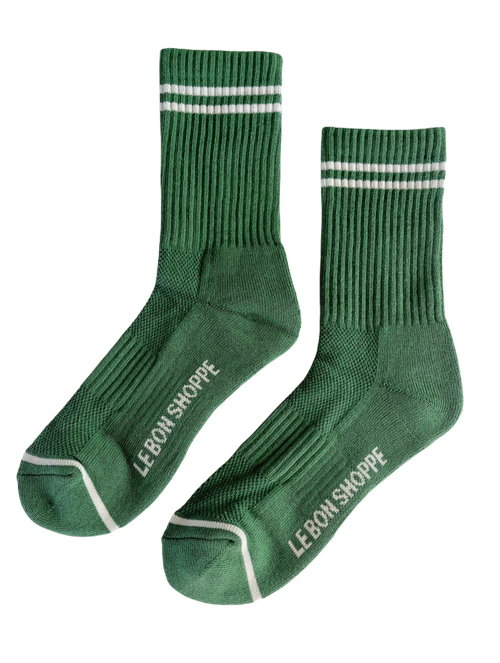 Green socks with white stripes an Le Bon Shoppe branding on white background.