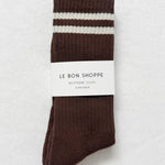 Brown socks with white stripes on a light gray background, featuring 'Le Bon Shoppe' branding.