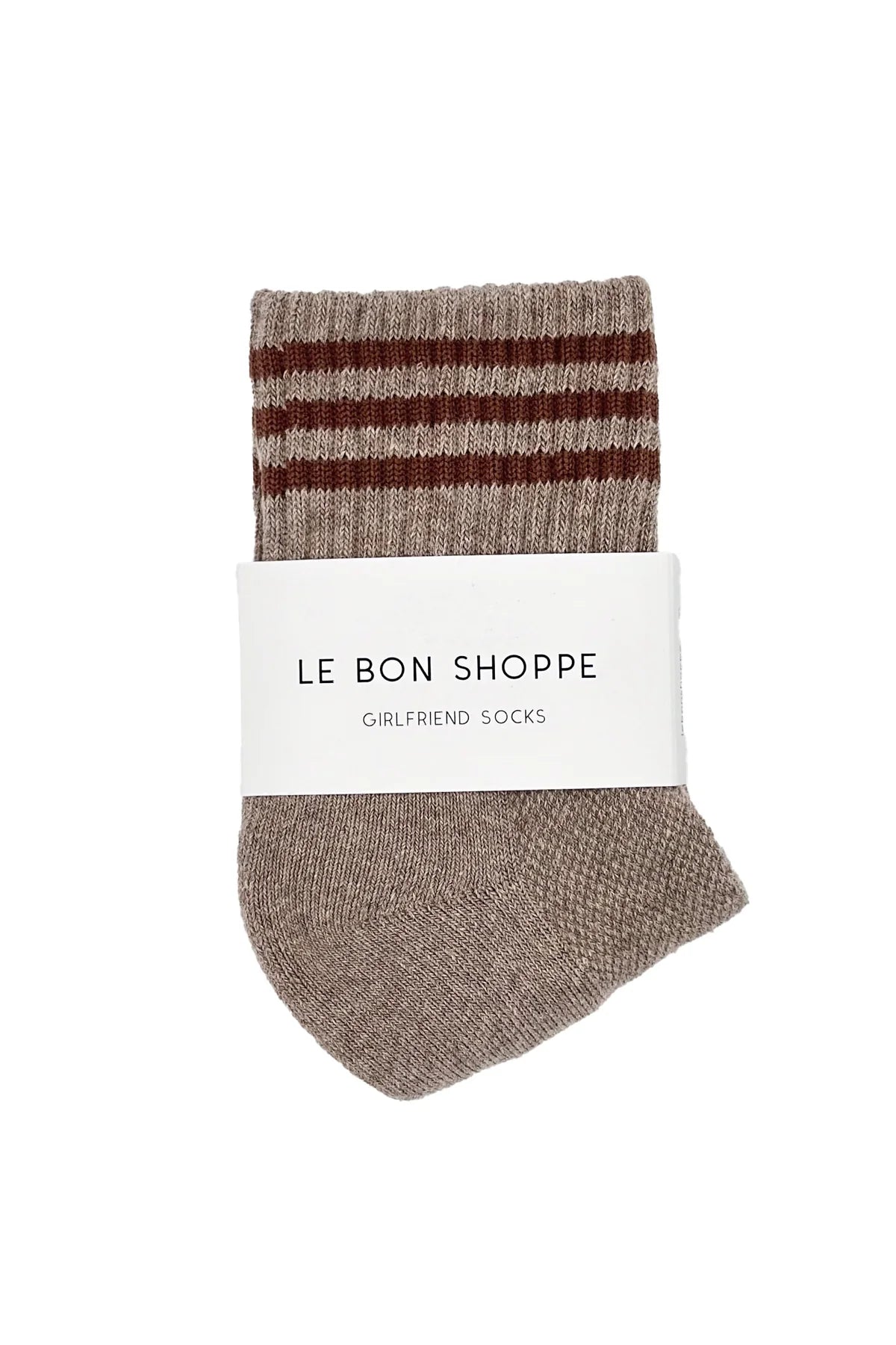 Pair of brown striped socks with a white label on a white background