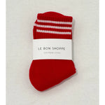 Red socks with white stripes in white Le Bon Shoppe packaging