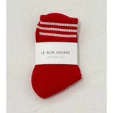 Red socks with white stripes in white Le Bon Shoppe packaging
