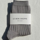 Gray socks with a 'Le Bon Shoppe' label on a light gray background