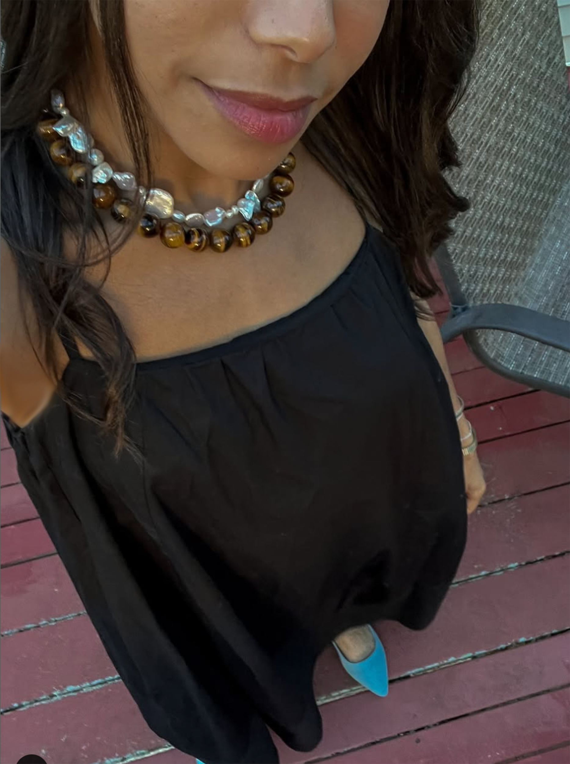 By Orly Jumbo Tigers Eye Necklace worn with layered necklaces
