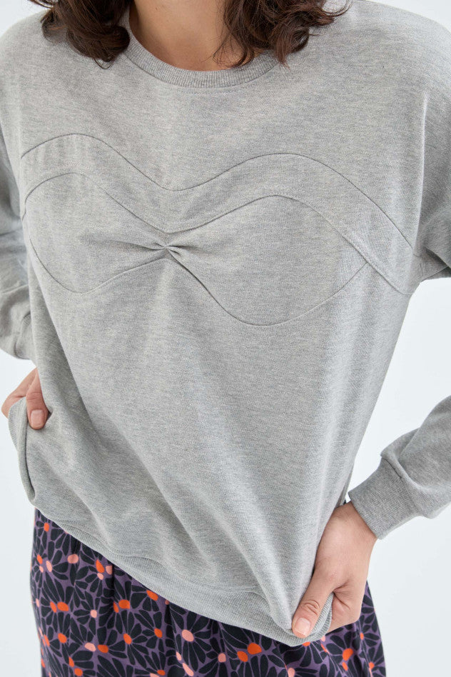 A close up image showing the chest detail of the Sweatshirt with Seam Detail