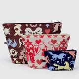 Three colorful pouches with different patterns on a white background