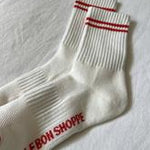 White socks with red stripes on a white background