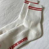 White socks with red stripes on a white background
