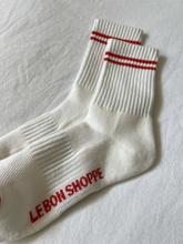 White socks with red stripes on a white background