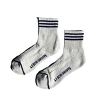 Oatmeal socks with navy stripes on white background