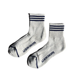Oatmeal socks with navy stripes on white background