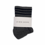 Grey socks with black stripes on white background