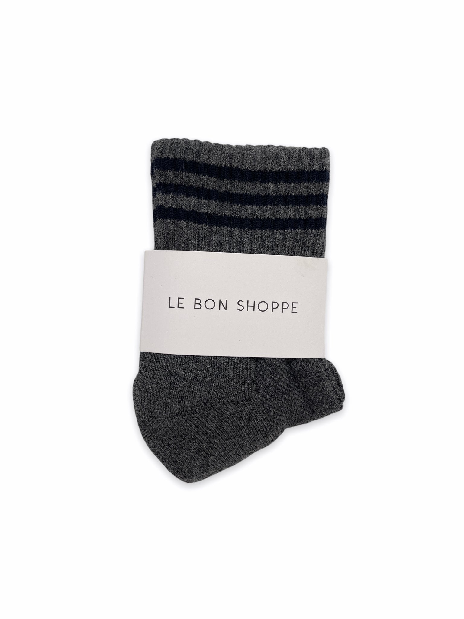 Grey socks with black stripes on white background