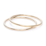 Women's hand with simple gold rings
