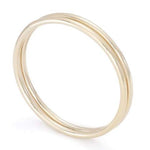 Women's hand with simple gold rings