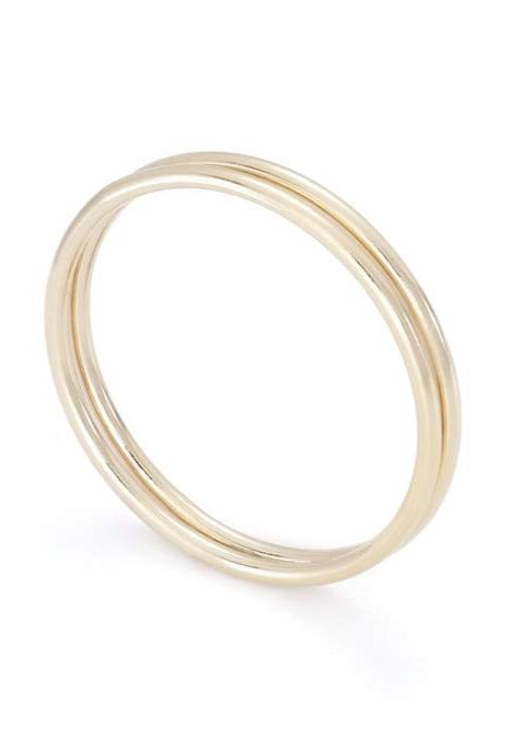Women's hand with simple gold rings