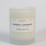 Candle in frosted white glass vessel