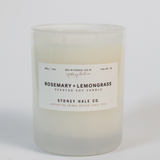 Candle in frosted white glass vessel