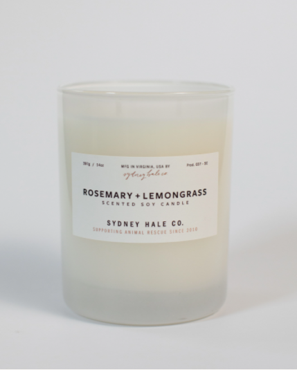 Candle in frosted white glass vessel