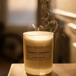 Candle in frosted white glass vessel