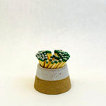 Ceramic match holder with matches