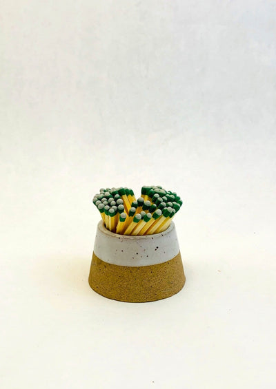 Ceramic match holder with matches