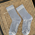 Powder blue crew socks with white stripe toppers