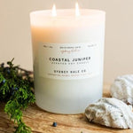 Candle in a frosted cream glass vessel