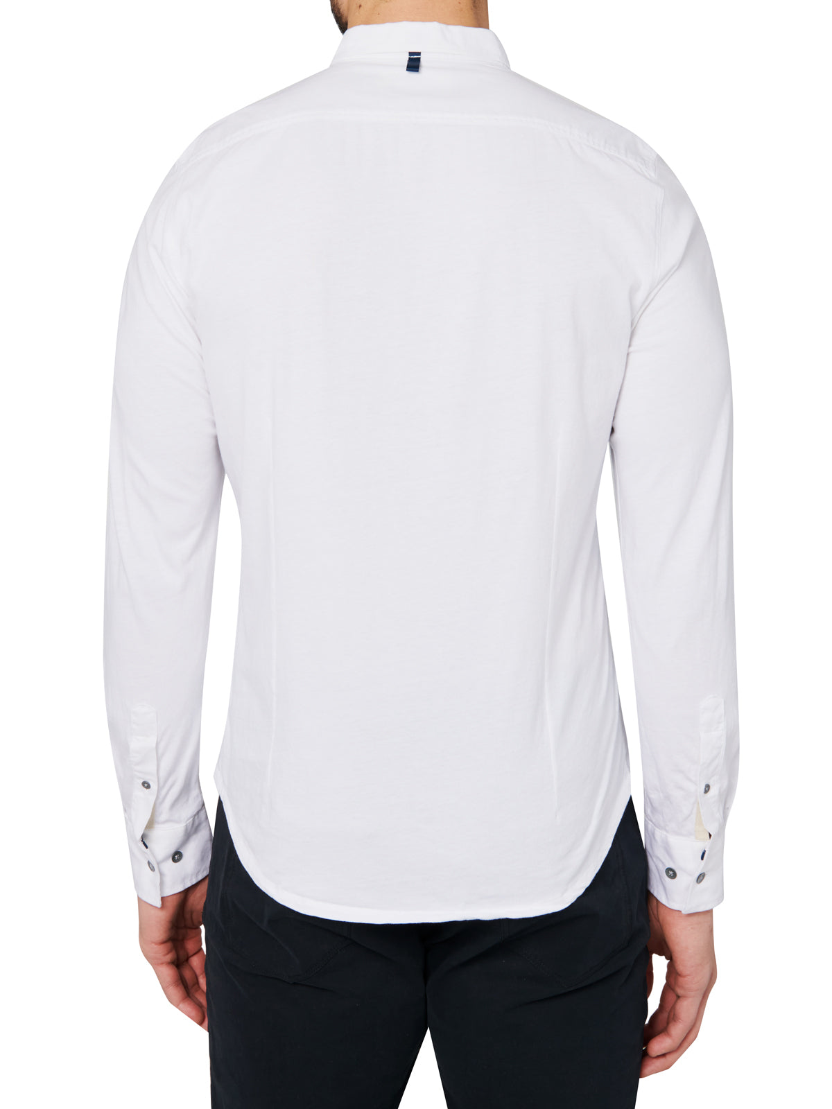Male model wearing white button down shirt