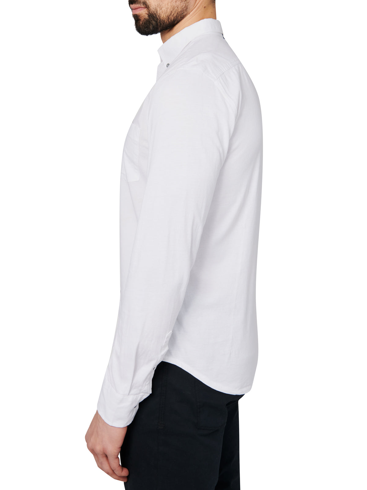 Male model wearing white button down shirt