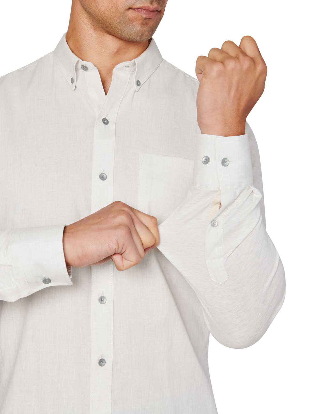 Man wearing White button up shirt and black jeans