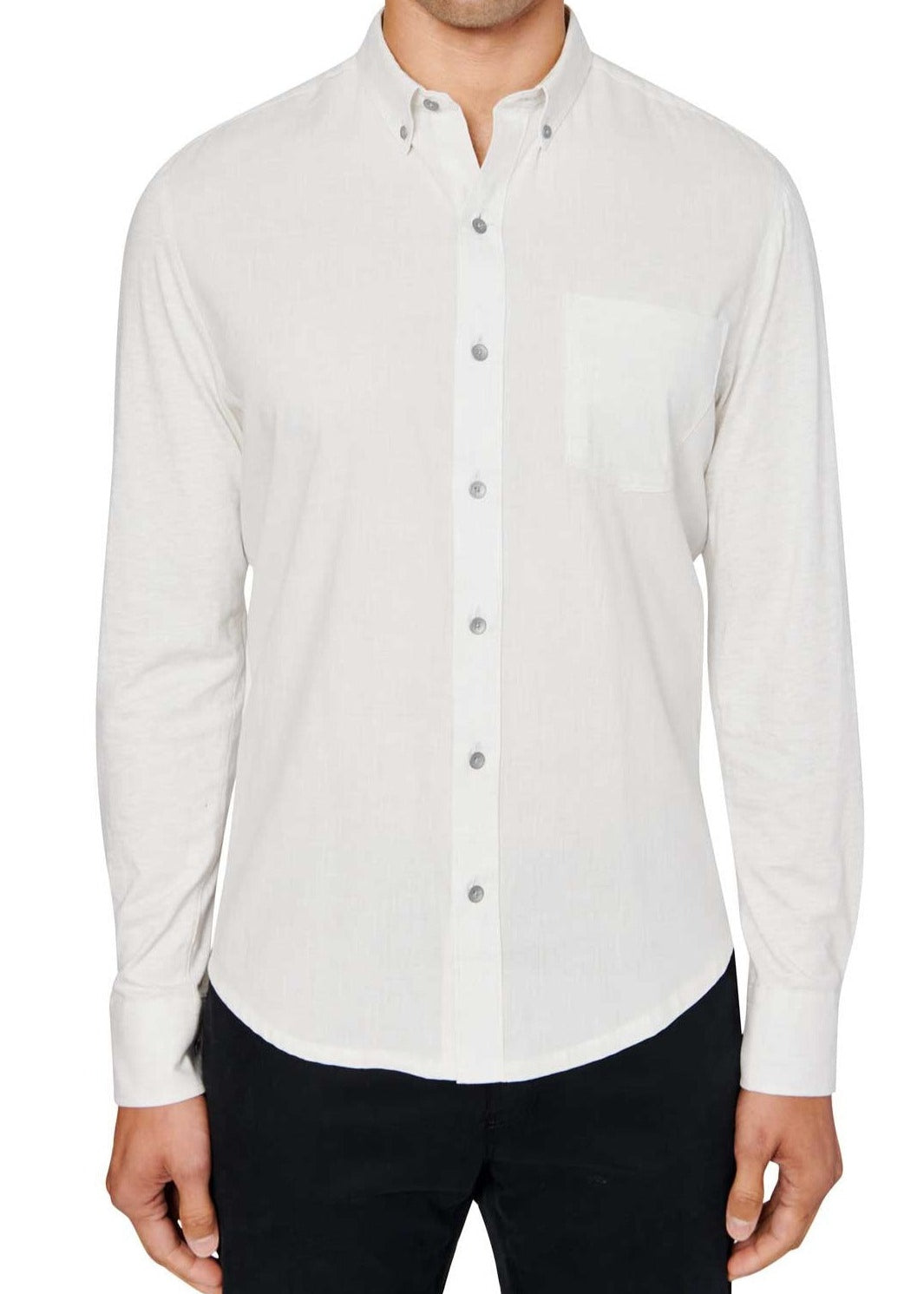Man wearing White button up shirt and black jeans