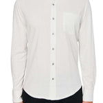Man wearing White button up shirt and black jeans