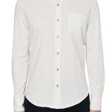 Man wearing White button up shirt and black jeans