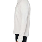 Man wearing White button up shirt and black jeans